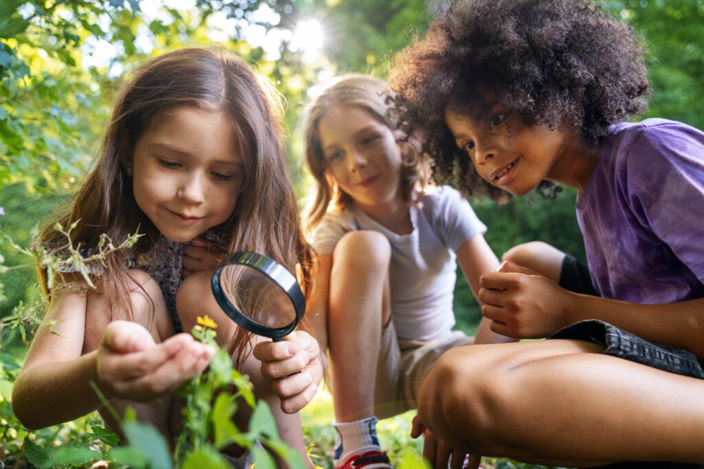 full shot smiley kids outdoors